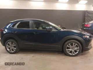 2024 Mazda CX-30 S Preferred z VIN 3MVDMBCM9RM700673, wystawiony jako IAAI lot #42417844 z przebiegiem 7 385 mil mil oraz . Historia ofert i sprzedaży dostępna na DreamBid. Obrazek 13.