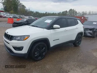 2020 Jeep Compass Latitude with VIN 3C4NJCBB9LT118042, listed as a IAAI auction lot 41811634 with 62,717 mi miles and . Bid and sale history available at carsss.com. Image 18.