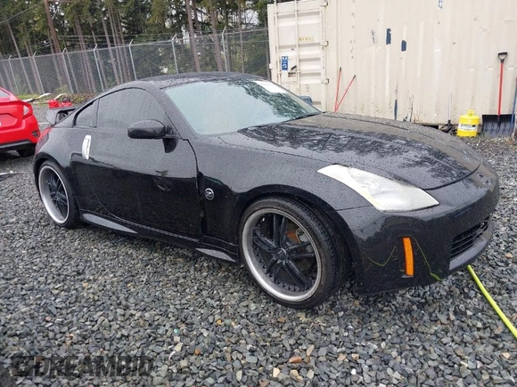 2003 Nissan 350Z Touring with VIN JN1AZ34EX3T013345, listed as a IAAI auction lot 41984329 with 102,115 mi miles. Bid and sale history available at carsss.com. Image 1.