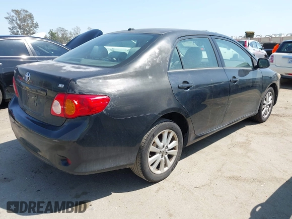 2009 Toyota Corolla with VIN 1NXBU40E89Z056754, listed as a IAAI auction lot 41989594 with 187,890 mi miles. Bid and sale history available at carsss.com. Image 4.