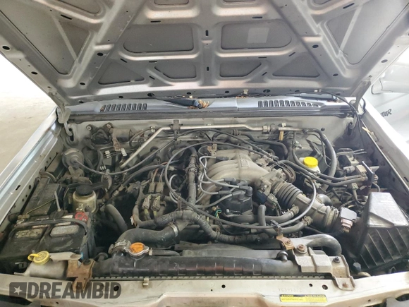 2000 Nissan Frontier XE z VIN 1N6ED27Y0YC391322, wystawiony jako Copart lot #60598405 z przebiegiem Nie podano mil oraz Czysty tytuł • Clean title. Historia ofert i sprzedaży dostępna na DreamBid. Obrazek 11.