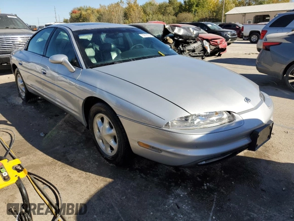 1999 Oldsmobile Aurora with VIN 1G3GR62C7X4109461, listed as a Copart auction lot 75916764 with 107,690 mi miles and Salvage Title. Bid and sale history available at DreamBid. Image 4.