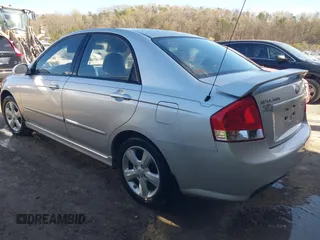 2009 Kia Spectra EX with VIN KNAFE221295026738, listed as a IAAI auction lot 41871548 with 238,130 mi miles. Bid and sale history available at carsss.com. Image 3.