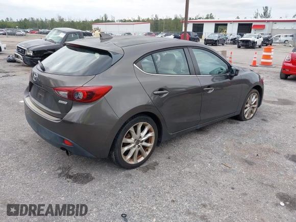 2015 Mazda 3 S Grand Touring with VIN JM1BM1M35F1264244, listed as a IAAI auction lot 41674683 with 119,684 mi miles and . Bid and sale history available at DreamBid. Image 4.