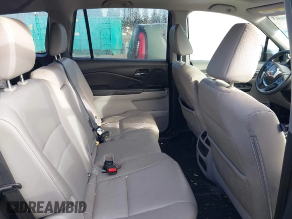 2017 Honda Pilot EX-L with VIN 5FNYF6H5XHB059834, listed as a IAAI auction lot 41670003 with 58,285 mi miles and . Bid and sale history available at DreamBid. Image 8.