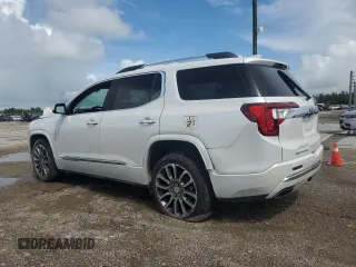 2022 GMC Acadia Denali with VIN 1GKKNPLS9NZ154553, listed as a Copart auction lot 69231444 with 105,997 mi miles and Salvage Title. Bid and sale history available at carsss.com. Image 2.