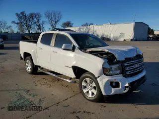 2015 GMC Canyon 2WD SLE with VIN 1GTG5BE3XF1239945, listed as a Copart auction lot 41541745 with 194,120 mi miles and Salvage Title. Bid and sale history available at carsss.com. Image 4.