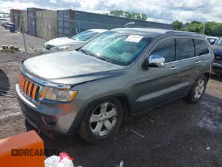 2011 Jeep Grand Cherokee Overland Summit with VIN 1J4RR6GT3BC713812, listed as a IAAI auction lot 42398585 with 208,476 mi miles and . Bid and sale history available at DreamBid. Image 17.