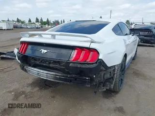2019 Ford Mustang EcoBoost with VIN 1FA6P8THXK5143703, listed as a IAAI auction lot 42056207 with 71,251 mi miles and . Bid and sale history available at carsss.com. Image 4.