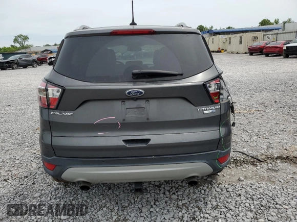 2018 Ford Escape Titanium with VIN 1FMCU9J97JUB34691, listed as a Copart auction lot 56404625 with 107,037 mi miles and Salvage title. Bid and sale history available at DreamBid. Image 6.