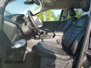 2019 Ford Escape Titanium with VIN 1FMCU0J96KUB22884, listed as a Copart auction lot 61979665 with 63,824 mi miles and Salvage title. Bid and sale history available at DreamBid. Image 7.