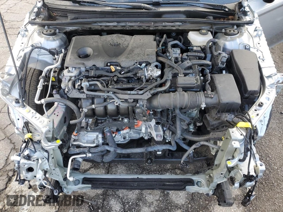 2025 Toyota Camry LE z VIN 4T1DAACK8SU007349, wystawiony jako Copart lot #48939945 z przebiegiem 25 107 mil mil oraz Szkoda całkowita • Salvage title. Historia ofert i sprzedaży dostępna na DreamBid. Obrazek 13.
