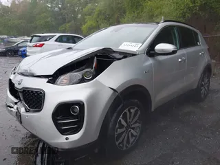 2018 Kia Sportage EX z VIN KNDPNCAC8J7309766, wystawiony jako IAAI lot #42219243 z przebiegiem 90 745 mil mil oraz . Historia ofert i sprzedaży dostępna na DreamBid. Obrazek 17.