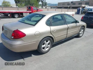 2001 Ford Taurus SES with VIN 1FAFP55U61A104864, listed as a IAAI auction lot 42004016 with 166,694 mi miles and . Bid and sale history available at carsss.com. Image 4.