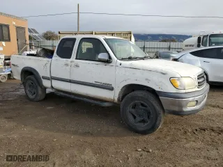 2002 Toyota Tundra SR5 with VIN 5TBRT34162S256817, listed as a Copart auction lot 72203284 with 377,931 mi miles and Salvage Title. Bid and sale history available at carsss.com. Image 4.