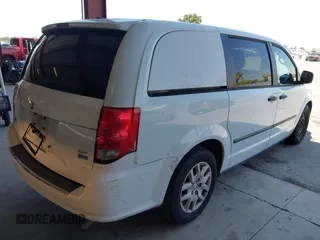 2014 Ram Cargo Van Tradesman with VIN 2C4JRGAG8ER389868, listed as a IAAI auction lot 42126547 with 208,859 mi miles. Bid and sale history available at carsss.com. Image 4.
