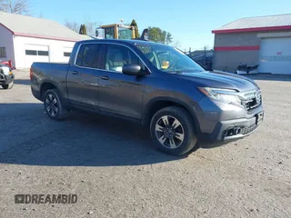 2017 Honda Ridgeline RTL z VIN 5FPYK3F50HB002126, wystawiony jako IAAI lot #42008881 z przebiegiem 191 286 mil mil oraz . Historia ofert i sprzedaży dostępna na DreamBid. Obrazek 1.