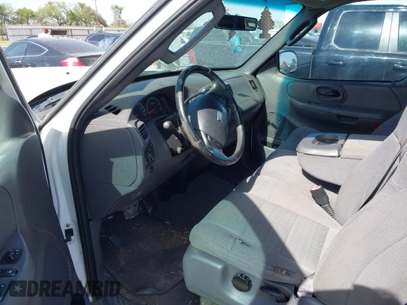 2003 Ford F-150 XL with VIN 1FTRX07L83KB50711, listed as a IAAI auction lot 41832990 with 201,328 mi miles and . Bid and sale history available at DreamBid. Image 5.