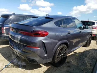 2022 BMW X6 M50i z VIN 5UXCY8C04N9K18587, wystawiony jako Copart lot #62977162 z przebiegiem Nie podano mil oraz . Historia ofert i sprzedaży dostępna na DreamBid. Obrazek 4.