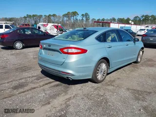2013 Ford Fusion Energi SE Luxury with VIN 3FA6P0PU2DR282331, listed as a IAAI auction lot 41635104 with 61,231 mi miles. Bid and sale history available at carsss.com. Image 4.