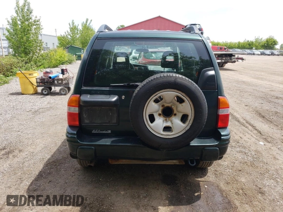2003 Suzuki Vitara JLX z VIN 2S3TD52V136101732, wystawiony jako Copart lot #58477845 z przebiegiem 105 628 mil mil oraz Czysty tytuł • Clean title. Historia ofert i sprzedaży dostępna na DreamBid. Obrazek 6.