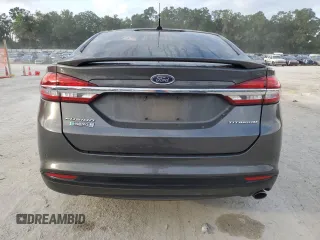 2017 Ford Fusion Titanium z VIN 3FA6P0SU0HR290201, wystawiony jako Copart lot #60106095 z przebiegiem 98 086 mil mil oraz Szkoda całkowita • Salvage title. Historia ofert i sprzedaży dostępna na DreamBid. Obrazek 6.