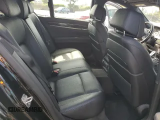 2013 BMW 7 Series 740i with VIN WBAYA6C58DC994974, listed as a Copart auction lot 55534645 with 106,975 mi miles and Salvage title. Bid and sale history available at DreamBid. Image 10.