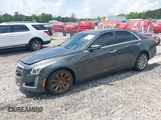 2014 Cadillac CTS Sedan RWD with VIN 1G6AP5SX2E0188411, listed as a IAAI auction lot 42106784 with 151,171 mi miles. Bid and sale history available at carsss.com. Image 2.
