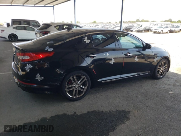 2013 Kia Optima SX с VIN 5XXGR4A65DG190896, выставлен на аукционе Copart как лот 59630485 с пробегом 136 385 миль миль и Списание • Salvage title. История ставок и продаж доступна на DreamBid. Изображение 3.