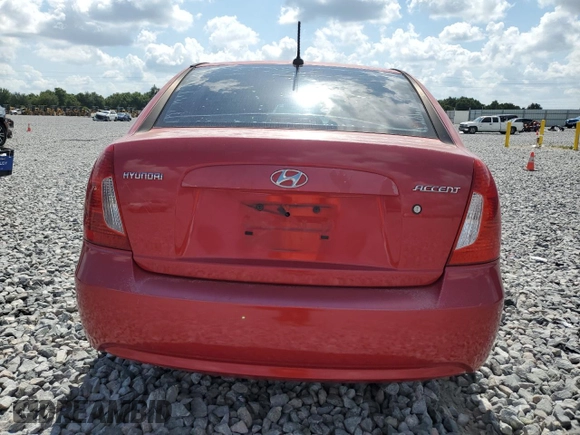 2011 Hyundai Accent GLS z VIN KMHCN4AC6BU621572, wystawiony jako Copart lot #57753025 z przebiegiem 108 395 mil mil oraz Szkoda całkowita • Salvage title. Historia ofert i sprzedaży dostępna na DreamBid. Obrazek 6.