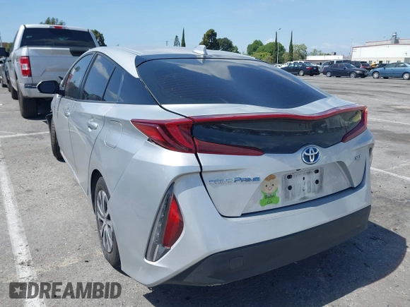 2021 Toyota Prius LE with VIN JTDKAMFP1M3180370, listed as a IAAI auction lot 41928512 with 83,249 mi miles and . Bid and sale history available at DreamBid. Image 3.