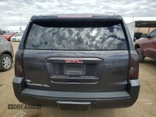 2018 GMC Yukon XL SLT with VIN 1GKS2GKC0JR136892, listed as a Copart auction lot 61352354 with 101,093 mi miles and Clean Title. Bid and sale history available at carsss.com. Image 6.
