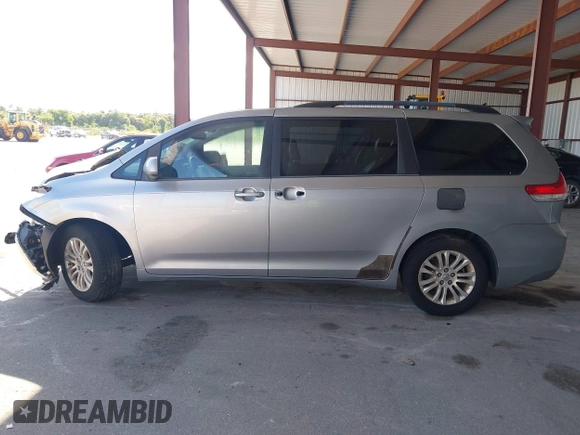 2013 Toyota Sienna XLE AAS with VIN 5TDYK3DC3DS297044, listed as a IAAI auction lot 42552470 with 143,947 mi miles and . Bid and sale history available at DreamBid. Image 14.