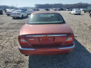 2005 Jaguar XJ Vanden Plas z VIN SAJWA82C75SG33074, wystawiony jako Copart lot #48725755 z przebiegiem 129 817 mil mil oraz Czysty tytuł • Clean title. Historia ofert i sprzedaży dostępna na DreamBid. Obrazek 6.