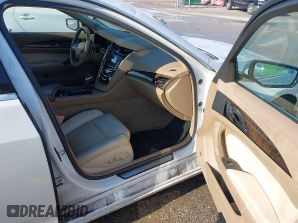 2015 Cadillac CTS Luxury AWD z VIN 1G6AX5SX9F0107244, wystawiony jako IAAI lot #42386444 z przebiegiem 171 413 mil mil oraz . Historia ofert i sprzedaży dostępna na DreamBid. Obrazek 5.