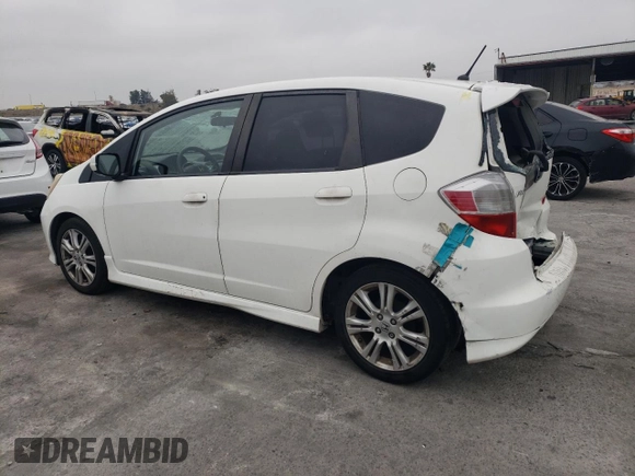 2009 Honda Fit Sport with VIN JHMGE88409S066991, listed as a Copart auction lot 52823425 with 275,722 mi miles and Salvage Title. Bid and sale history available at carsss.com. Image 2.