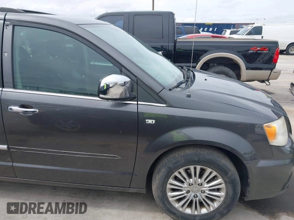 2014 Chrysler Town & Country Touring L with VIN 2C4RC1CG7ER300693, listed as a IAAI auction lot 41849463 with 174,203 mi miles and . Bid and sale history available at carsss.com. Image 17.