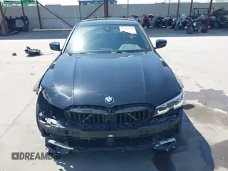 2019 BMW 3 Series 330i with VIN WBA5R1C51KFH09402, listed as a IAAI auction lot 41869138 with 59,115 mi miles and . Bid and sale history available at DreamBid. Image 13.