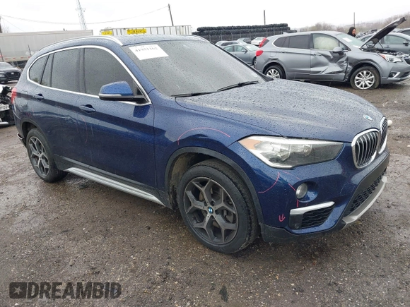 2019 BMW X1 sDrive28i z VIN WBXHU7C5XK5L10933, wystawiony jako IAAI lot #41931162 z przebiegiem 55 308 mil mil oraz . Historia ofert i sprzedaży dostępna na DreamBid. Obrazek 1.