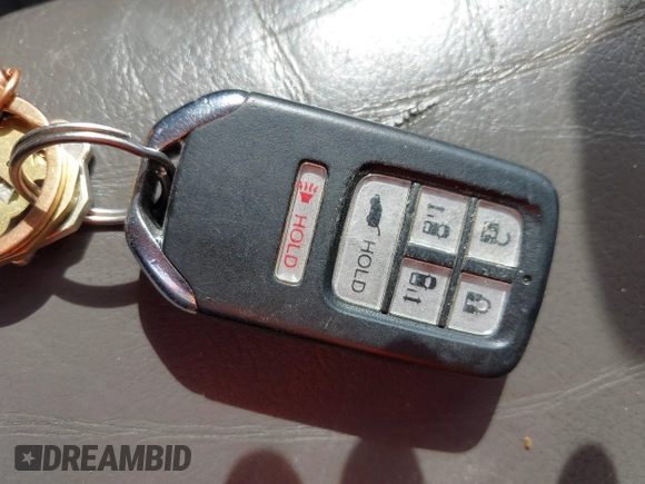 2014 Honda Odyssey Touring с VIN 5FNRL5H94EB057681, выставлен на аукционе IAAI как лот 41828000 с пробегом 249 350 миль миль и . История ставок и продаж доступна на DreamBid. Изображение 11.