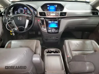 2016 Honda Odyssey EX-L with VIN 5FNRL5H67GB090747, listed as a Copart auction lot 53957235 with 131,464 mi miles and Salvage Title. Bid and sale history available at DreamBid. Image 8.