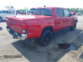 2020 Toyota Tacoma SR5 with VIN 3TMAZ5CN0LM125435, listed as a IAAI auction lot 42274793 with 91,460 mi miles and . Bid and sale history available at DreamBid. Image 4.