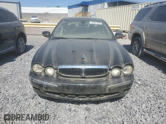 2002 Jaguar X-Type z VIN SAJEA51C02WC53526, wystawiony jako Copart lot #53761265 z przebiegiem 156 584 mil mil oraz Czysty tytuł • Clean title. Historia ofert i sprzedaży dostępna na DreamBid. Obrazek 5.