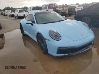 2024 Porsche 911 Carrera S with VIN WP0AB2A97RS220521, listed as a Copart auction lot 74099424 with 0 mi miles and Salvage Title. Bid and sale history available at carsss.com. Image 4.