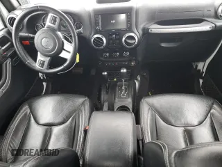 2016 Jeep Wrangler Unlimited Rubicon with VIN 1C4HJWFG9GL223928, listed as a Copart auction lot 58182125 with 57,711 mi miles and Salvage title. Bid and sale history available at DreamBid. Image 8.