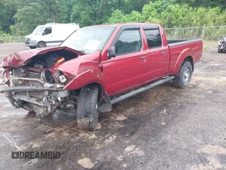 2004 Nissan Frontier XE z VIN 1N6ED29X54C451190, wystawiony jako IAAI lot #42205591 z przebiegiem 136 962 mil mil oraz . Historia ofert i sprzedaży dostępna na DreamBid. Obrazek 2.