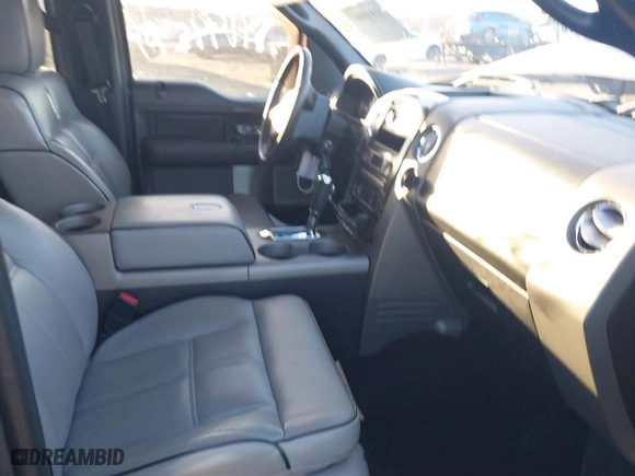 2007 Lincoln Mark LT with VIN 5LTPW16557FJ03103, listed as a IAAI auction lot 41445407 with 118,083 mi miles. Bid and sale history available at carsss.com. Image 5.