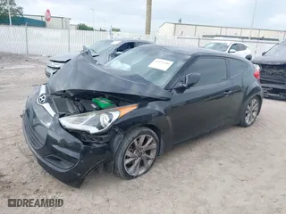 2016 Hyundai Veloster with VIN KMHTC6AD6GU251094, listed as a IAAI auction lot 41971550 with 97,744 mi miles. Bid and sale history available at carsss.com. Image 17.
