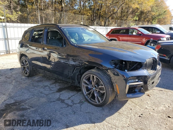 2019 BMW X3 M40i with VIN 5UXTS3C54K0Z09005, listed as a Copart auction lot 87682015 with Not Provided miles and Salvage Title. Bid and sale history available at DreamBid. Image 4.