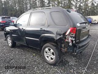 2010 Kia Sportage LX with VIN KNDKGCA33A7706645, listed as a IAAI auction lot 41387232 with 178,714 mi miles and . Bid and sale history available at carsss.com. Image 3.